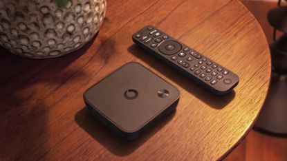 Vodafone TV box and remote on a tabletop