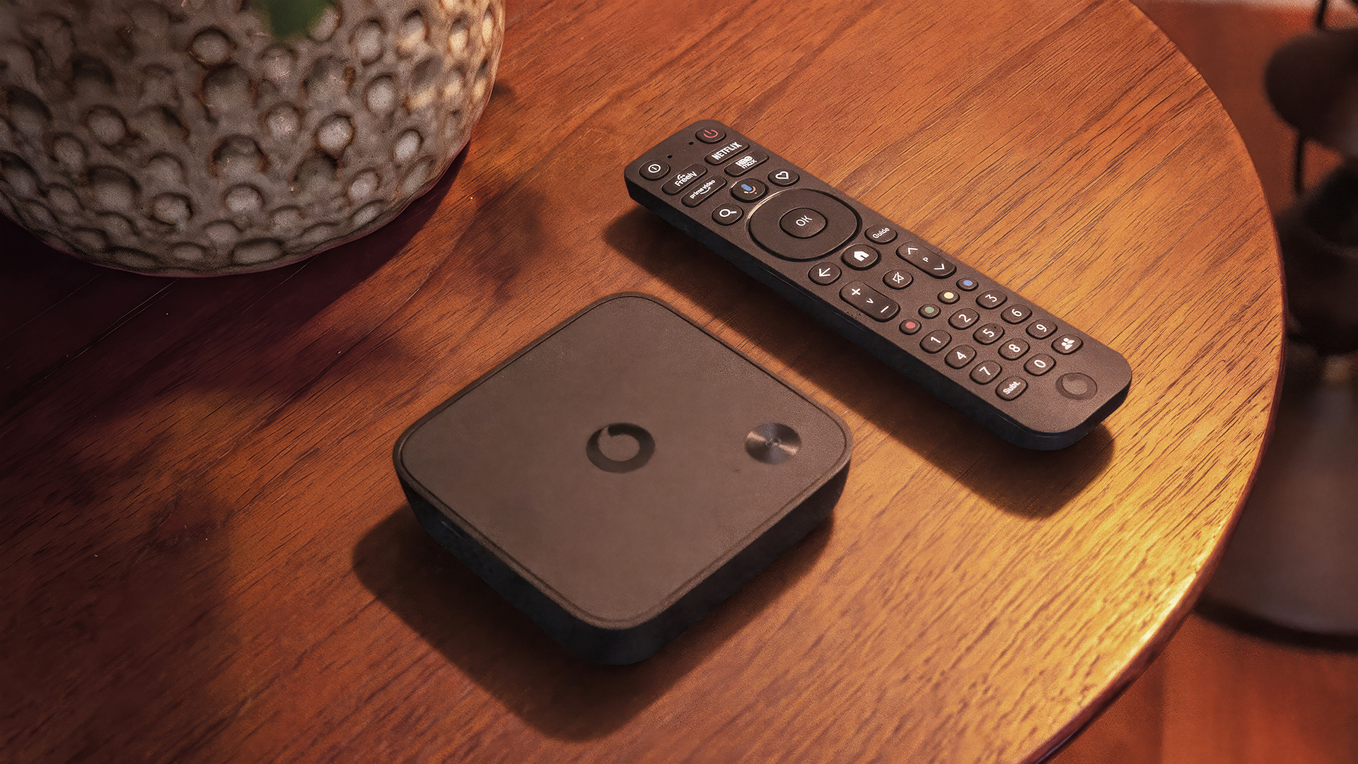 Vodafone TV box and remote on a tabletop