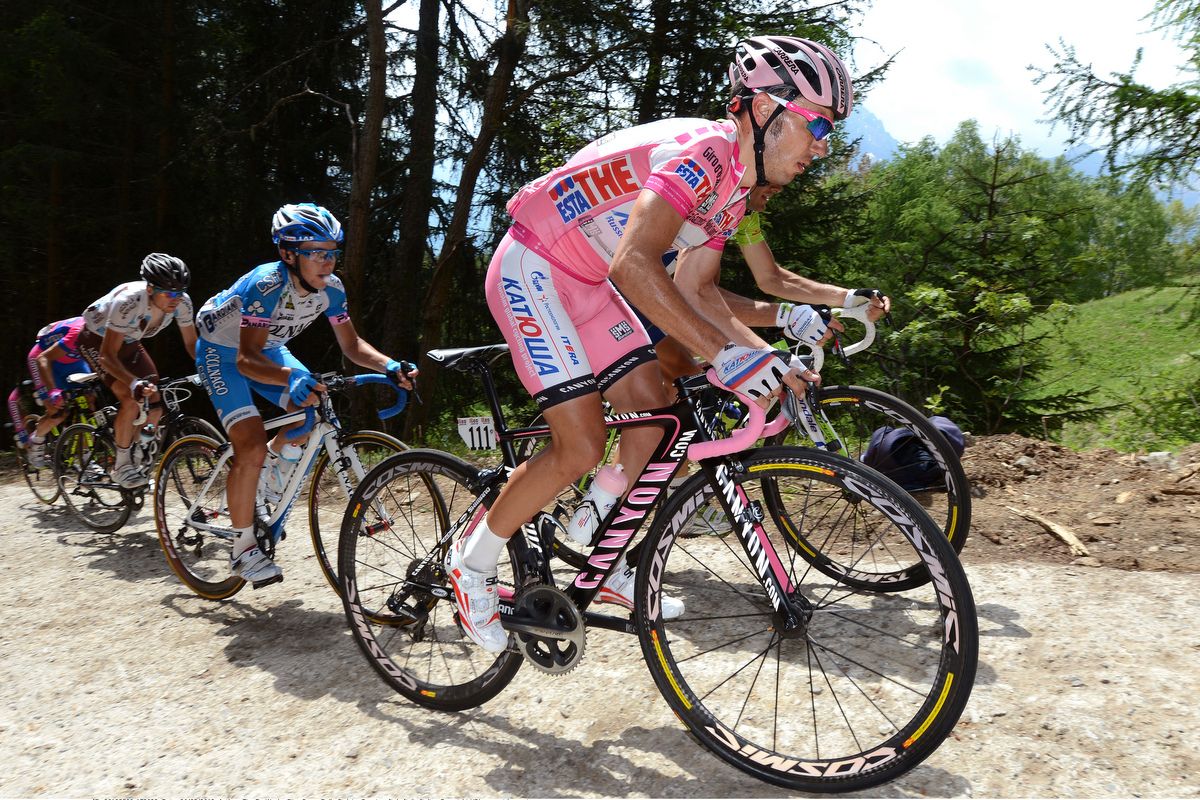 Rodriguez rides a Canyon in 2012 with pink decals and on the inside of the forks and stays