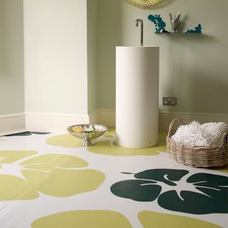 bathroom with patterned vinyl floral flooring