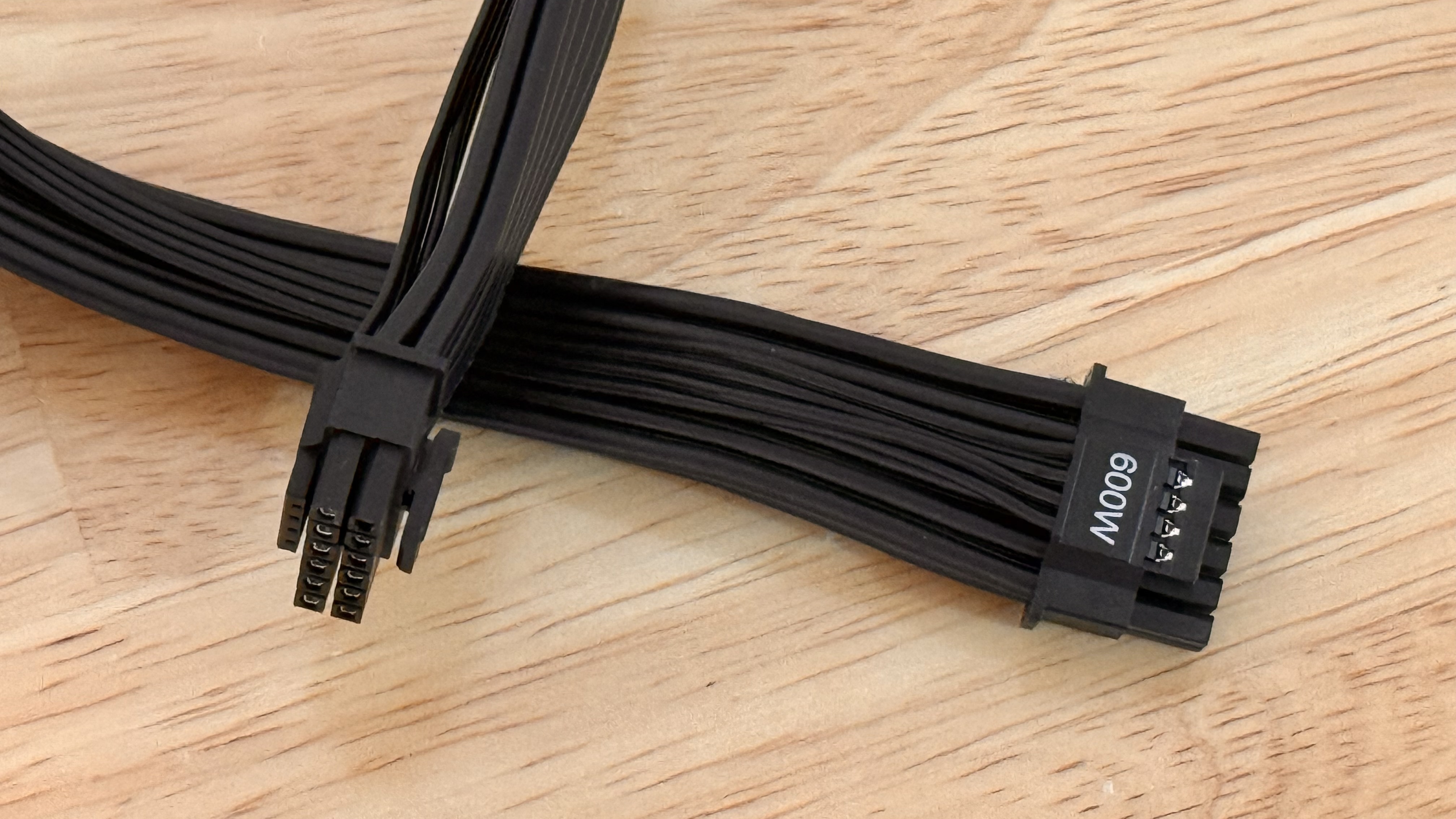 The included 12V-2x6 cable from a Montech Century II PSU