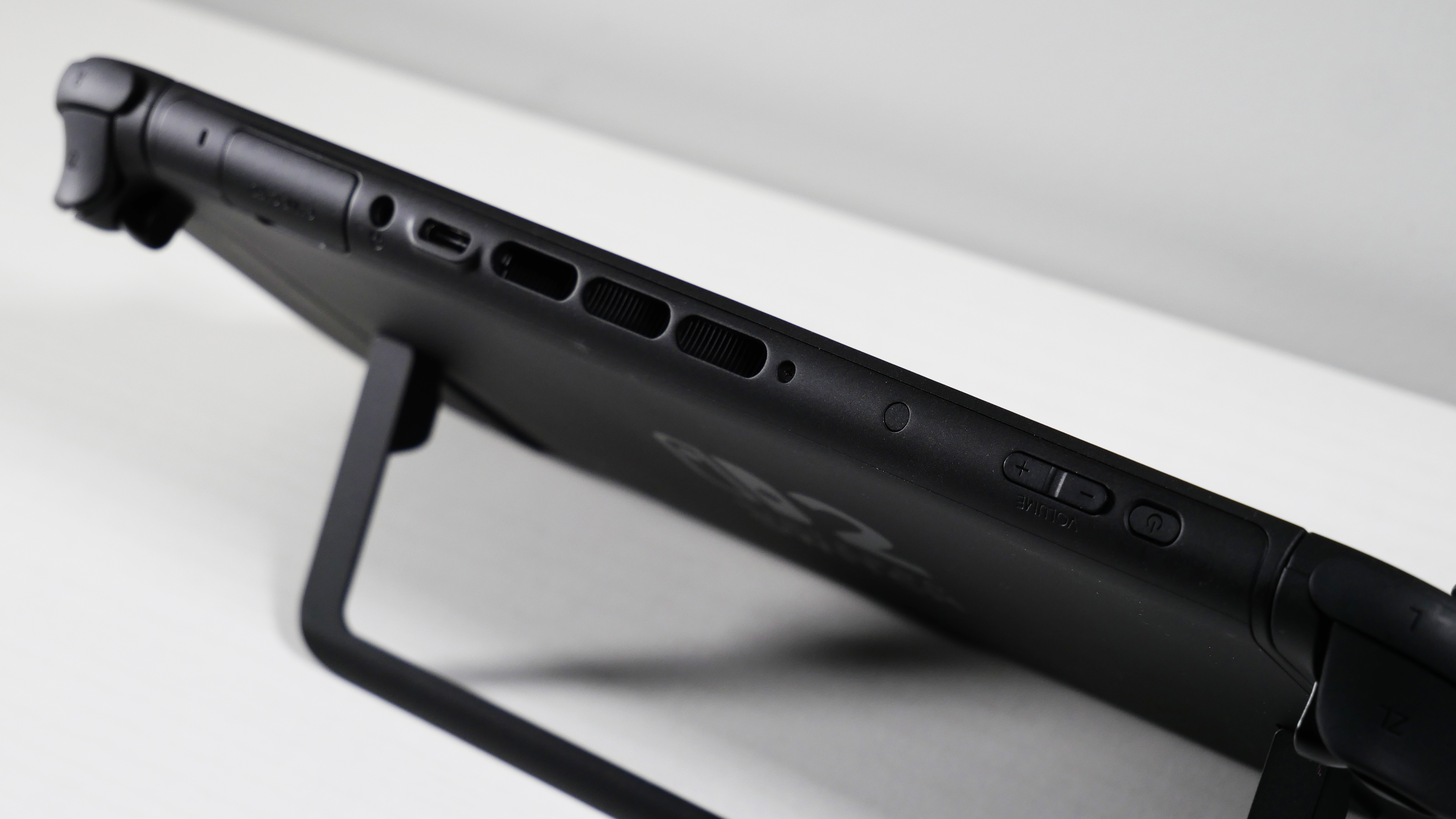 Nintendo Switch 2 on a white desk, highlighting its ports on the top.