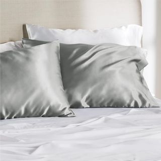 Bedsure Satin Pillowcase for Hair and Skin Queen in Silver on bed