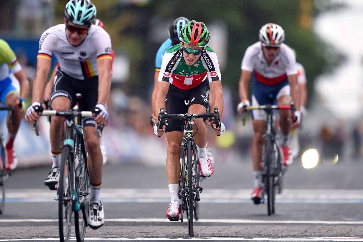 Dylan Page (Switzerland) leading home another small group