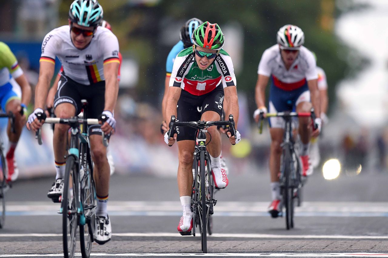 Dylan Page (Switzerland) leading home another small group