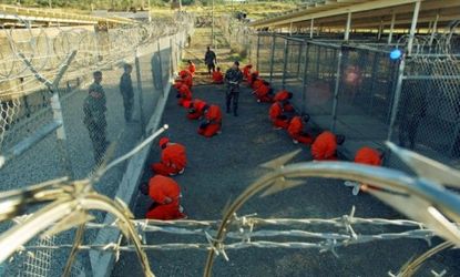 The opening day of Guantanamo Bay prison camp, on Jan. 11, 2002: Gitmo's mere existence is a mark of shame for the Western world, says Elizabeth O'Shea at the Sydney Morning Herald.