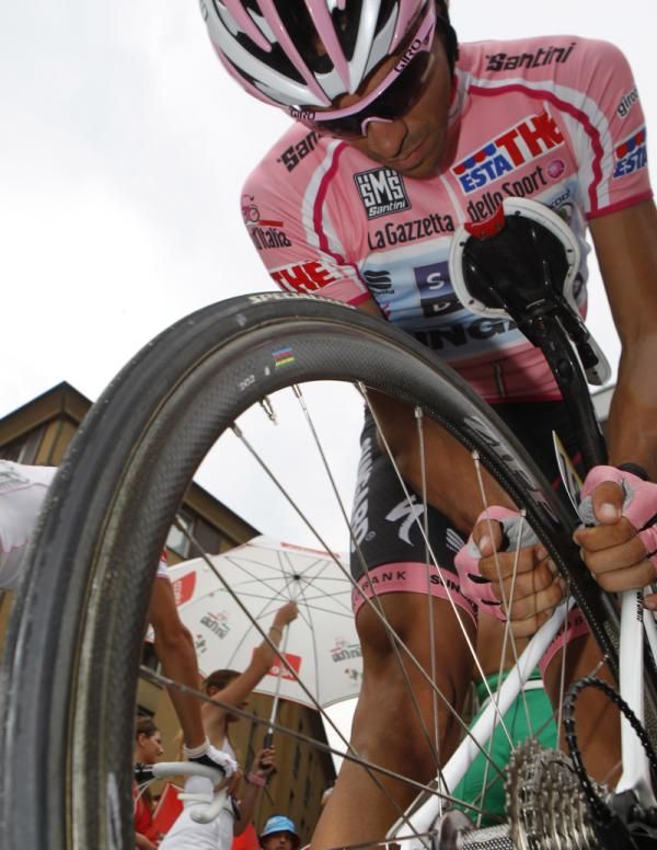 Alberto Contador (Saxo Bank) checks his brakes
