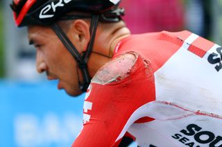 VISEGRAD HUNGARY MAY 06 Caleb Ewan of Australia and Team Lotto Soudal crosses the finish line injured after being involved in a crash during the 105th Giro dItalia 2022 Stage 1 a 195km stage from Budapest to Visegrd 337m Giro WorldTour on May 06 2022 in Visegrad Hungary Photo by Tim de WaeleGetty Images