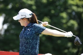 Leona Maguire stretches before hitting her first tee shot during the Meijer LPGA Classic of 2022