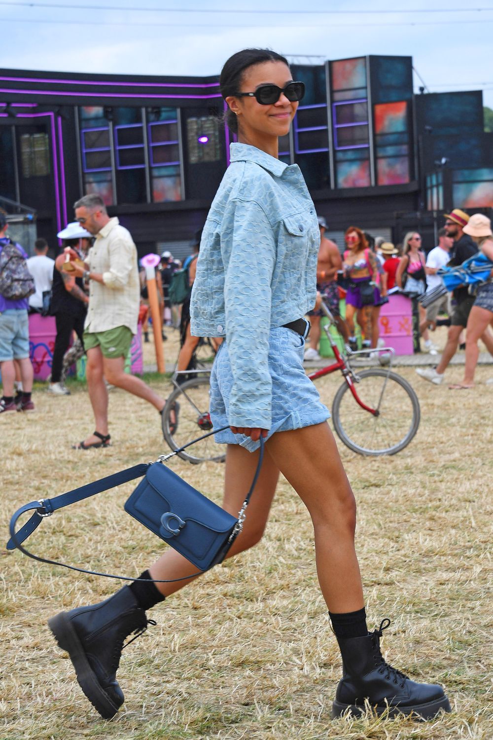 Celebrities at Glastonbury 2023: India Amarteifio wears Coach denim jacket and shorts