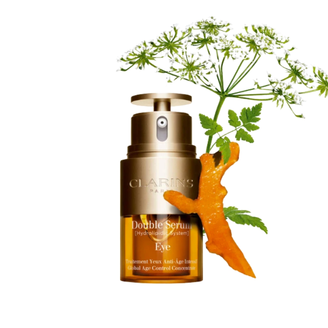 A product shot of the Clarins Double Eye serum, alongside some of the ingredients featured in the formula, on a white background