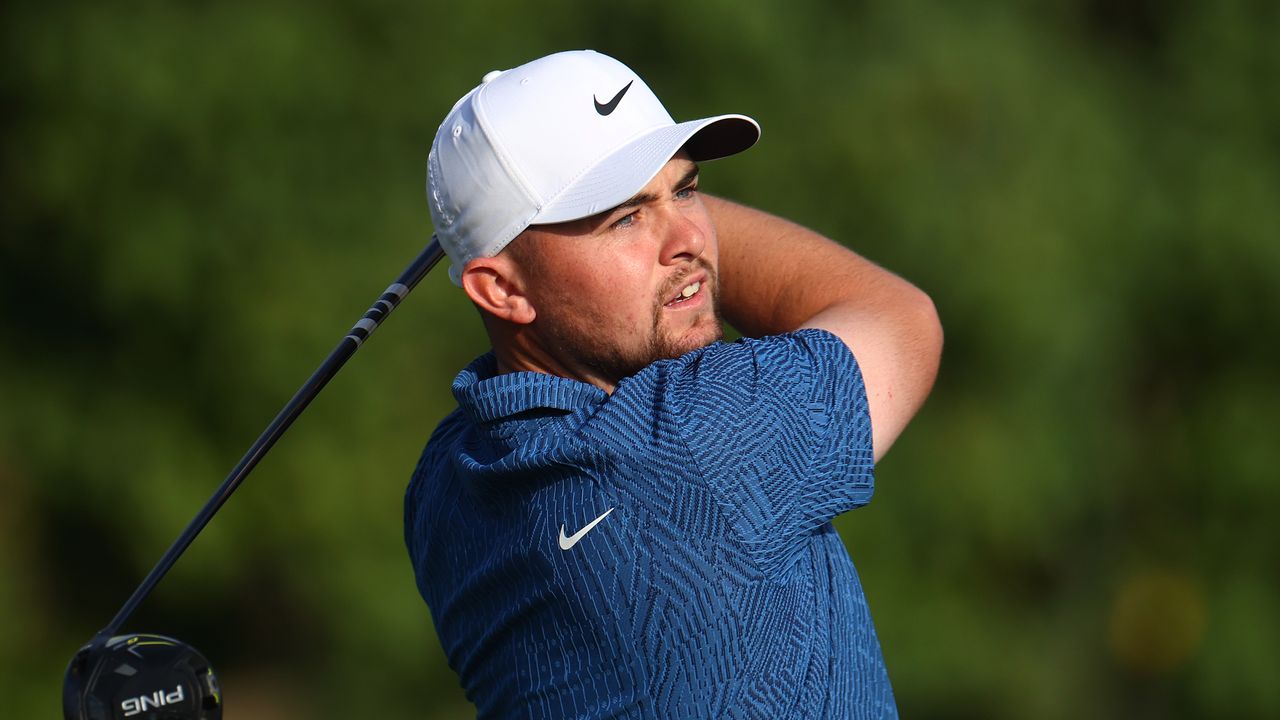 Alex Fitzpatrick takes a tee shot at the Hero Dubai Desert Classic