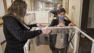 Hospital employees help assemble isopods