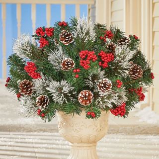 Frosted Pine Branches with Berries and Pinecones in a flowerpot