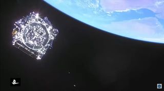 NASA'nın James Webb Uzay Teleskobu, 25 Aralık 2021'de fırlatılmasından sonra çekilen bu görüntüde arka planda parlak mavi Dünya ile Ariane 5 roketinden ayrılıyor.