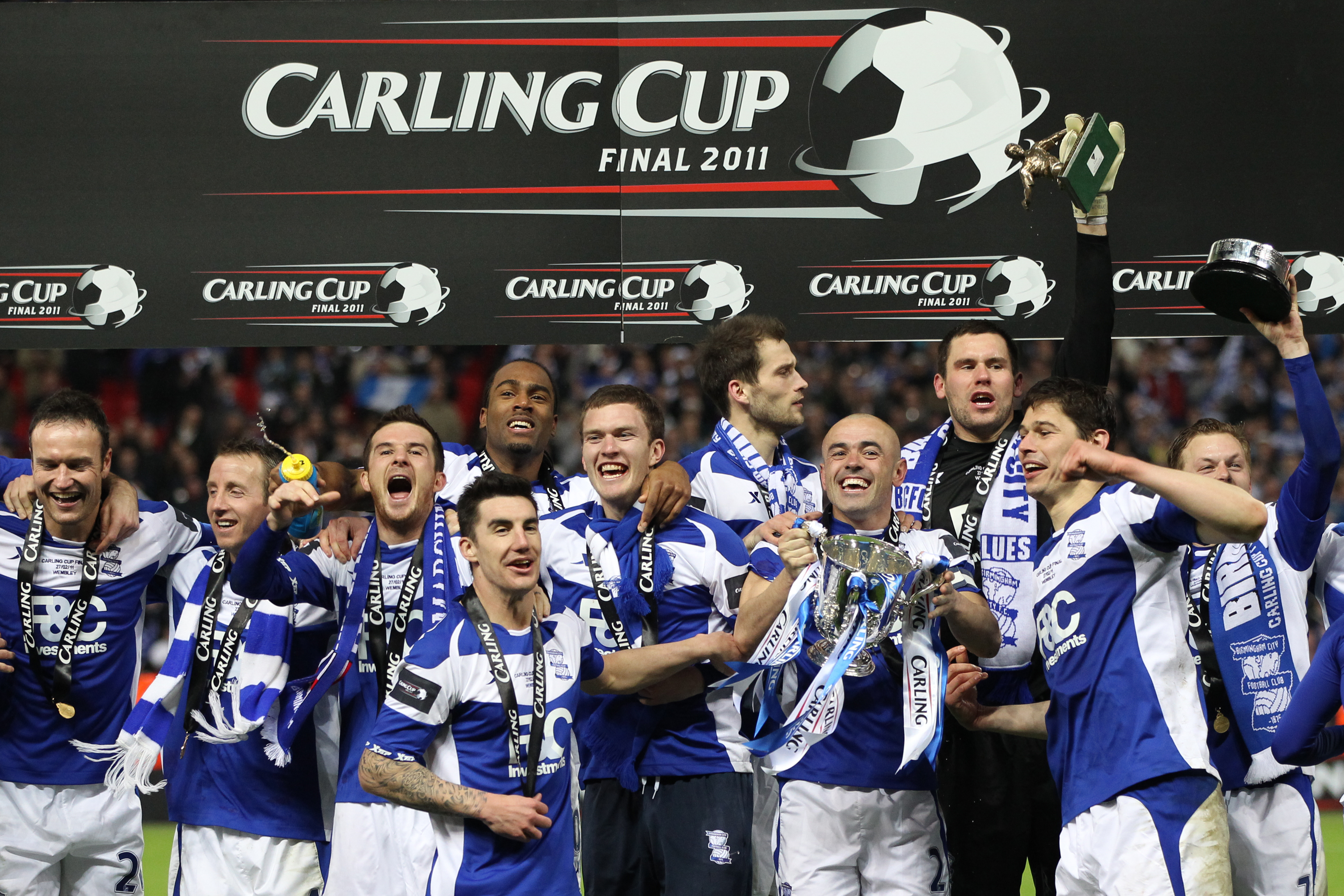 Birmingham City players celebrate their League Cup final win over Arsenal in February 2011.