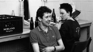 The Pogues’ Shane MacGowan and Cait O’Riordan backstage at a gig in 1985