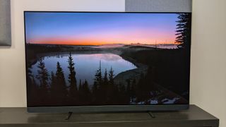 Philips OLED909 with sunset on screen