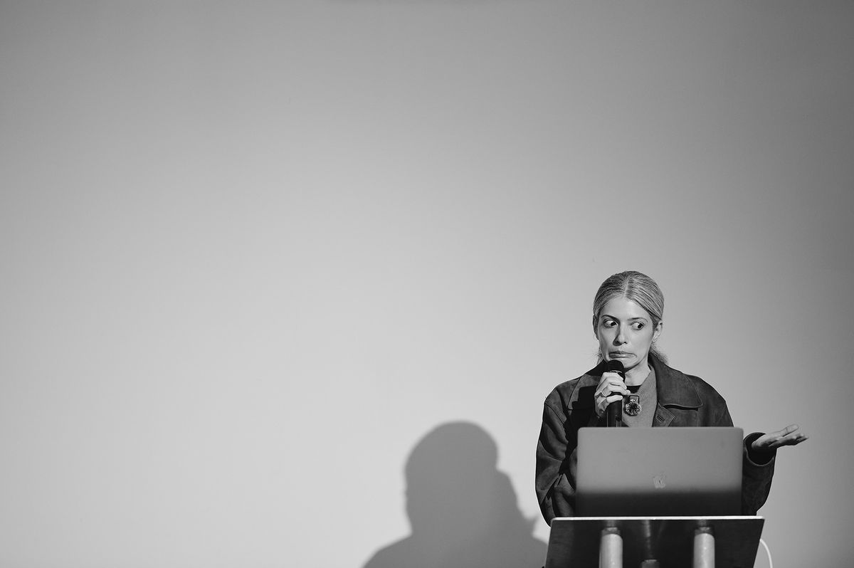 Photo titled Err... Not Sure?! by Valeriia Milenina. A speaker stuck for words during a talk at the Zorky London event, captured in a spontaneous and amusing moment on stage.