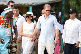 Prince Harry, Duke of Sussex and Meghan, Duchess of Sussex are seen in the streets of San Basilio de Palenque during a visit around Colombia on August 17, 2024 in Cartagena, Colombia