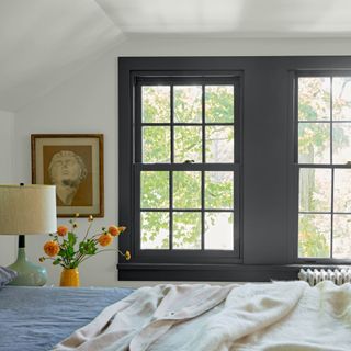 Bedroom with anthracite grey-painted window