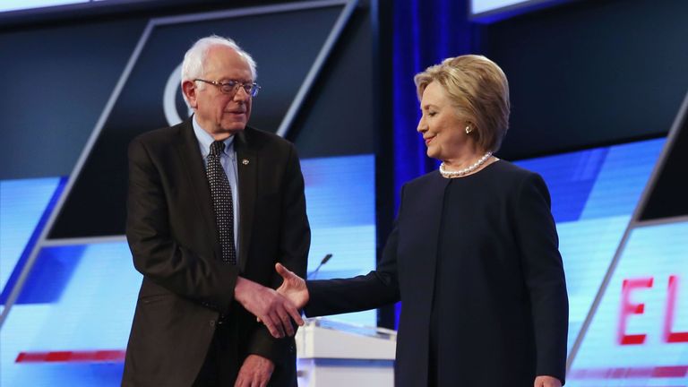 Bernie Sanders and Hillary Clinton shaking hands