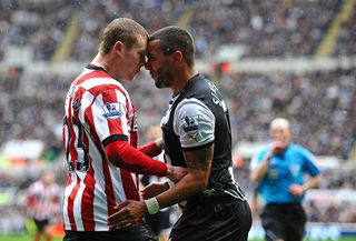  James McLean of Sunderland battles with Danny Simpson of Newcastle during the Barclays Premier League match between Newcastle United and Sunderland at Sports Direct Arena on March 4, 2012 in Newcastle upon Tyne, England