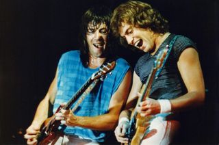 Pat Travers (left) and Pat Thrall perform onstage with The Pat Travers Band at the Reading Festival in Reading, England on August 23, 1980