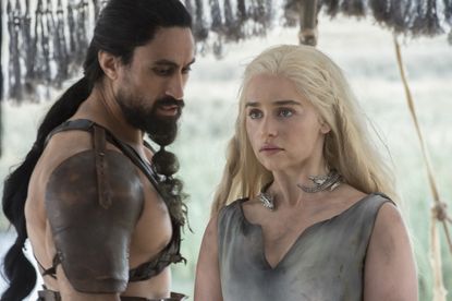 Joe Naufahu as Khal Moro and Emilia Clarke as Daenerys Targaryen