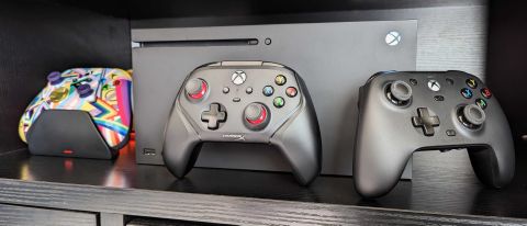 Image of the HyperX Clutch Gladiate in front of an Xbox Series X, alongside an Xbox Wireless Controller and GameSir G7.