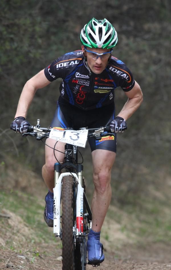 Olympian from the ProCycling Team Romania, Tudor Oprea, rides on the Roots section