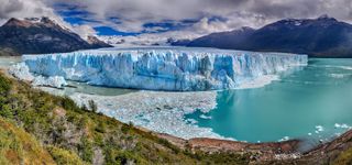 You can watch ice falling into a glacial lagoon in Argentina
