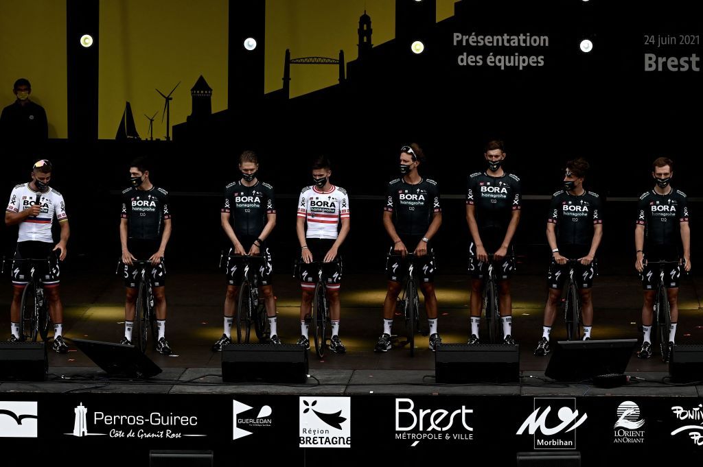 Team Bora Hansgrohes riders attend the teams presentation two days ahead of the first stage of the 108th edition of the Tour de France cycling race near Brest on June 24 2021 Photo by Philippe LOPEZ AFP Photo by PHILIPPE LOPEZAFP via Getty Images
