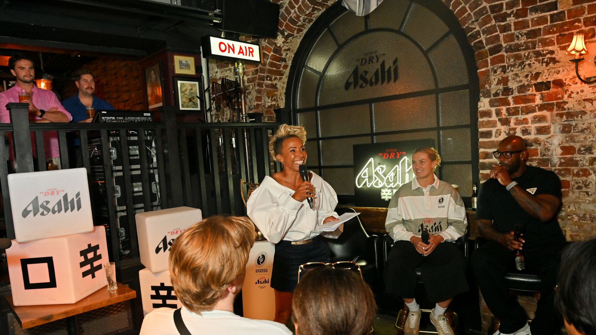 (L to R) Dame Kelly Holmes, Ellie Kildunne and Ugo Monye attend the launch night for The Asahi Open Arms ahead of The 2025 Women's Rugby World Cup created by Asahi Super Dry on August 11, 2025 in London, England