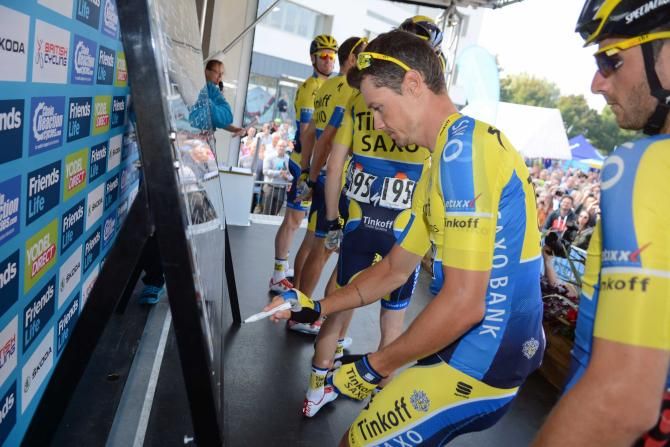 Nicolas Roche signs on at the Tour of Britain.