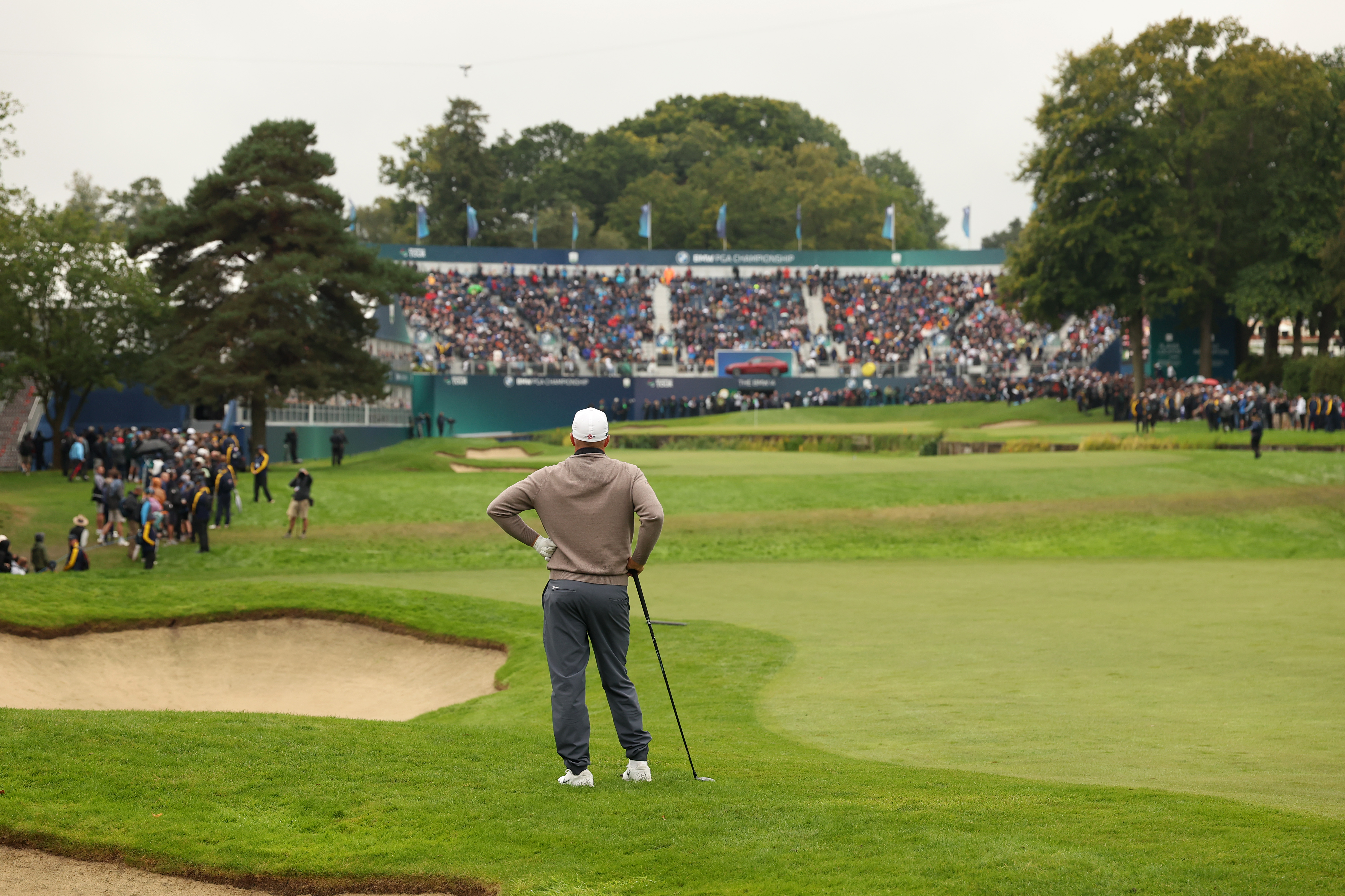 Alex Noren watches his shot at the 18th green