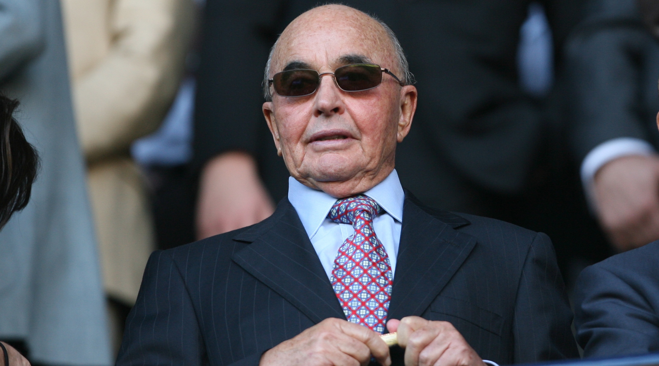 Tottenham Hotspur owner Joe Lewis, wearing sunglasses
