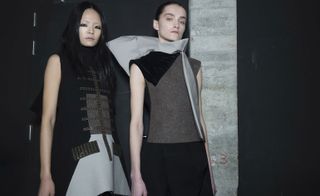 2 Female models dressed Rick Owens A/W 2015 collection bacstage of the fsahion show