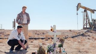 BJ Novak and Boyd Holbrook stand over a grave in Vengeance