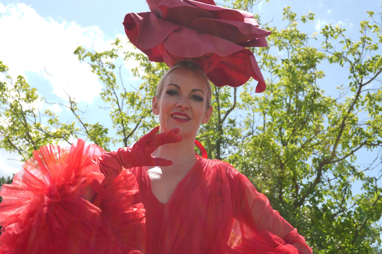 Sony ZV-E10 II sample images of model wearing bright red clothes