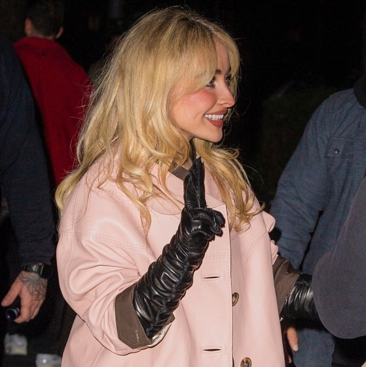 Sabrina Carpenter wore a Prada spring 2026 runway look in NYC, including a pink coat and satin underwear