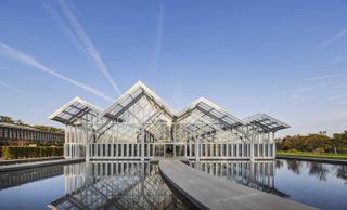 longwood gardens, lush greenery and a greenhouse