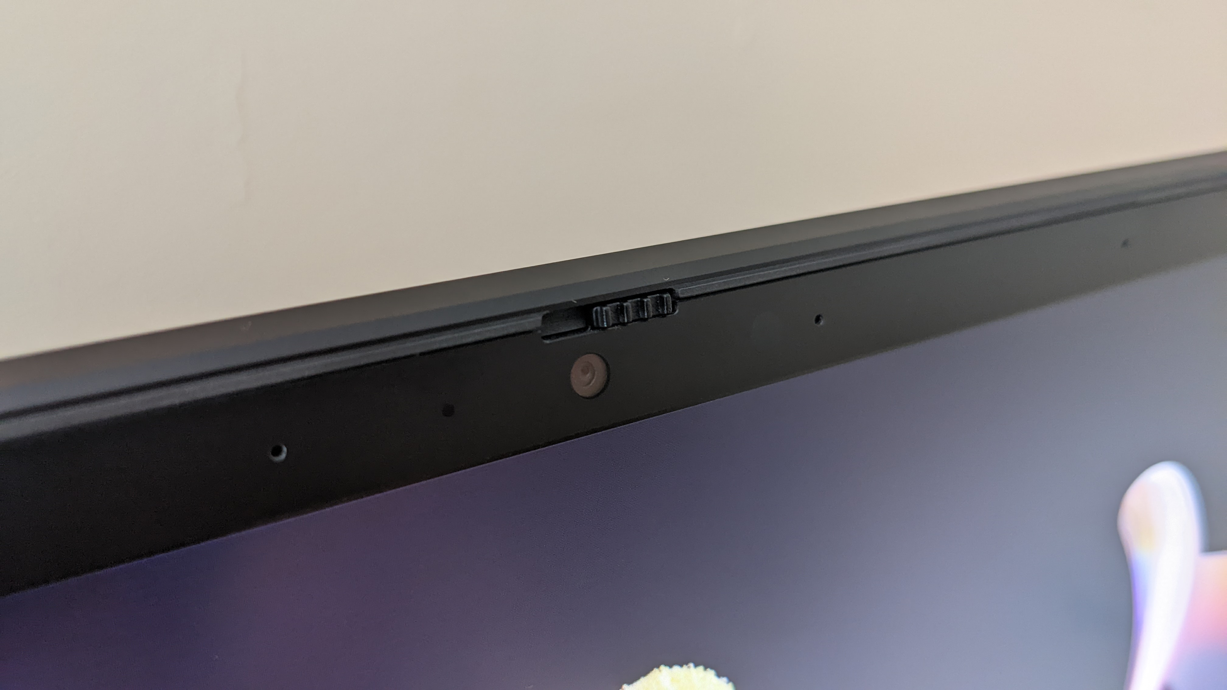 Closeup of the webcam and privacy shutter on the Corsair Voyager a1600 laptop.