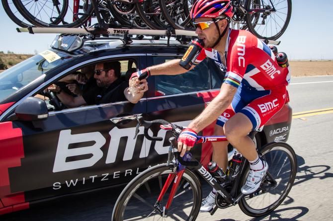 Thor Hushovd (BMC) gets ice bags and water bottles for the team