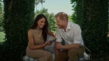 Prince Harry and Meghan Markle in the garden of their home in Montecito