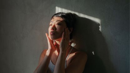 best face tan - a woman basking in the sunshine - getty images 1980528657