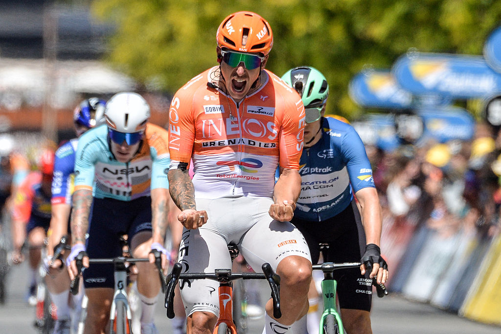 EDITORS NOTE: Graphic content / Ineos Grenadiers rider Sam Welsford from Australia celebrates winning stage three of the Tour Down Under UCI Men's Cycling race in Adelaide on January 23, 2026. (Photo by Brenton Edwards / AFP) / - IMAGE RESTRICTED TO EDITORIAL USE - STRICTLY NO COMMERCIAL USE -
