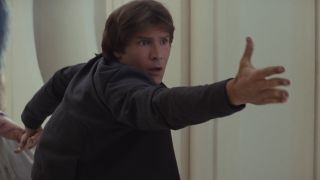 Han looking surprised after Vader took his blast with The Force