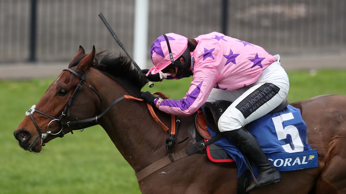 Storm Arising ridden by Bryony Frost, wearing pink jockey&#039;s silks, rides to a victory ahead of the previous Welsh Grand National