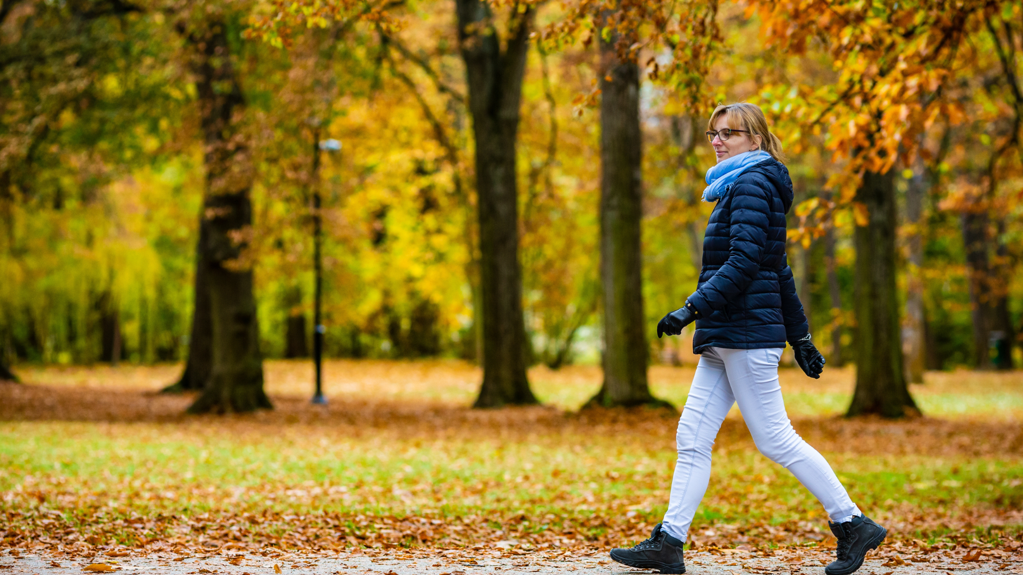 A woman walking at the park